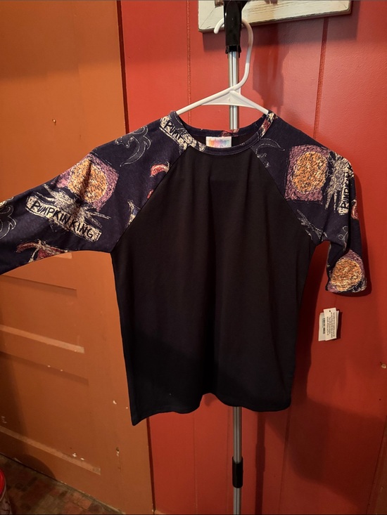 LuLaRoe Other - LuLaRoe Black Stretchy Tee with Nightmare Before Christmas Characters.
